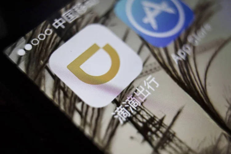 Didi Chuxing: nem a empresa local nem o Uber conseguiram ser rentáveis na China ainda (Qilai Shen/Bloomberg)