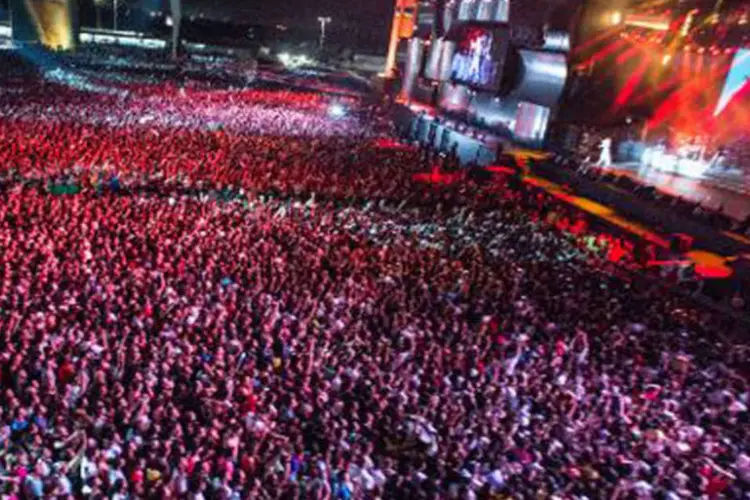 Multidão acompanha o show da cantora Ivete Sangalo, no 1º dia do Rock in Rio, 13 de setembro

 (Yasuyoshi Chiba/AFP)