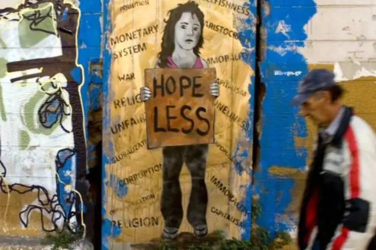 
	Grafite anti-austeridade em Atenas: a chave para um acordo final &eacute; uma an&aacute;lise sobre como fazer a d&iacute;vida da Gr&eacute;cia&nbsp;
 (Getty Images)
