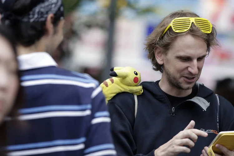 
	Pok&eacute;mon Go: &quot;Eu gostaria de correr pela Vila Ol&iacute;mpica capturando pok&eacute;mons&quot;, afirmou a jogadora neozelandeza de futebol Anna Green
 (Kiyoshi Ota/Bloomberg)