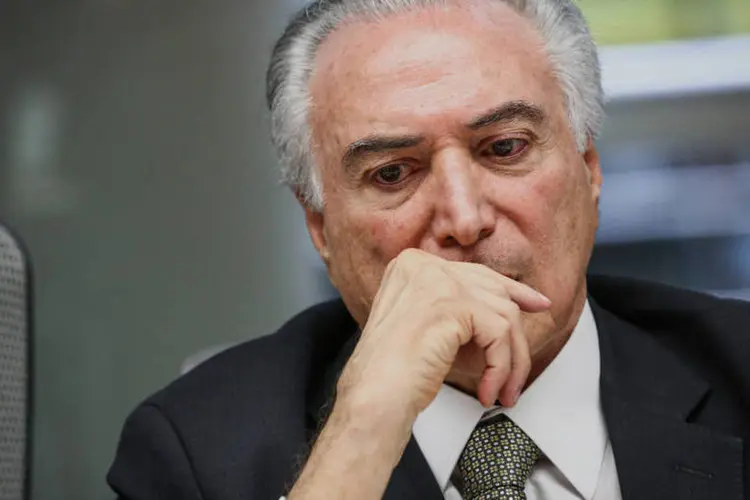 
	Michel Temer: o presidente n&atilde;o quis discutir a orienta&ccedil;&atilde;o que dar&aacute; &agrave; sua base na vota&ccedil;&atilde;o do assunto no Congresso Nacional
 (Christopher Goodney/Bloomberg)