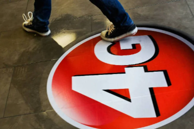 
	4G: dois maiores players do mercado, Vivo e TIM, somados, det&ecirc;m mais de dois ter&ccedil;os da base
 (David Ramos/Bloomberg)