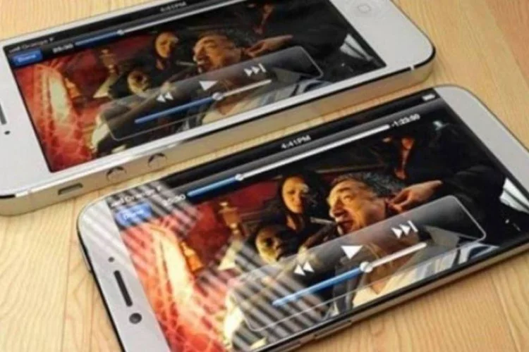
	iPhone 5s e iPhone 6: a ilustra&ccedil;&atilde;o mostra como poder&aacute; ficar o smartphone da Apple com tela maior
 (Martin Hajek e Steve Hemmerstoffer / NowheElse.fr)