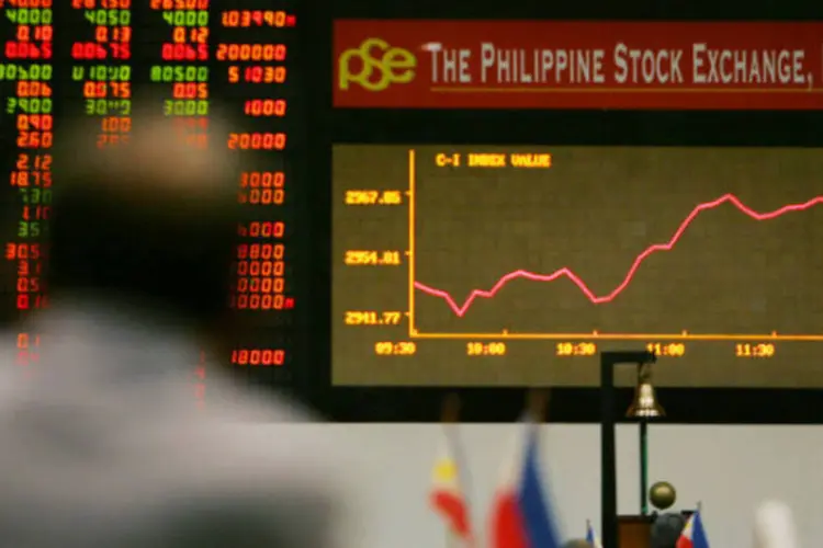 
	Nas Filipinas, a Bolsa de Manila tamb&eacute;m foi estimulada pelos coment&aacute;rios de Bernanke, levando o &iacute;ndice PSEi a terminar a sess&atilde;o em alta de 0,2%, a 6.616,27 pontos
 (Paula Bronstein/Getty Images)