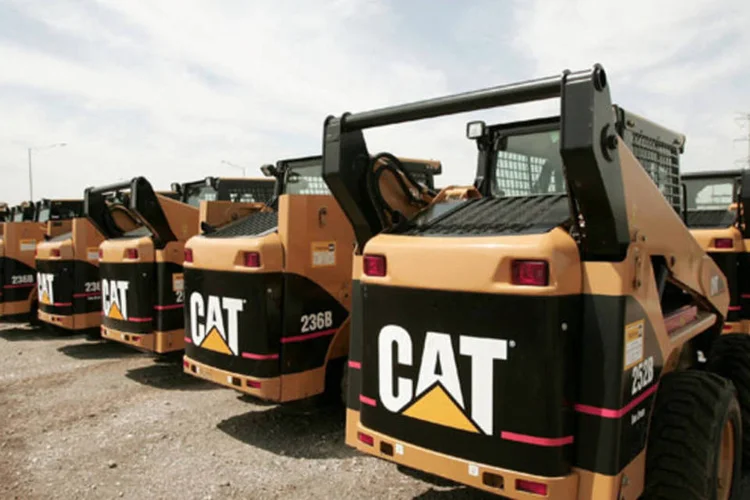 
	Tratores da Caterpillar: companhia manteve a proje&ccedil;&atilde;o de lucro por a&ccedil;&atilde;o em 2015 inalterada em 4,70 d&oacute;lares
 (Scott Olson/Getty Images)