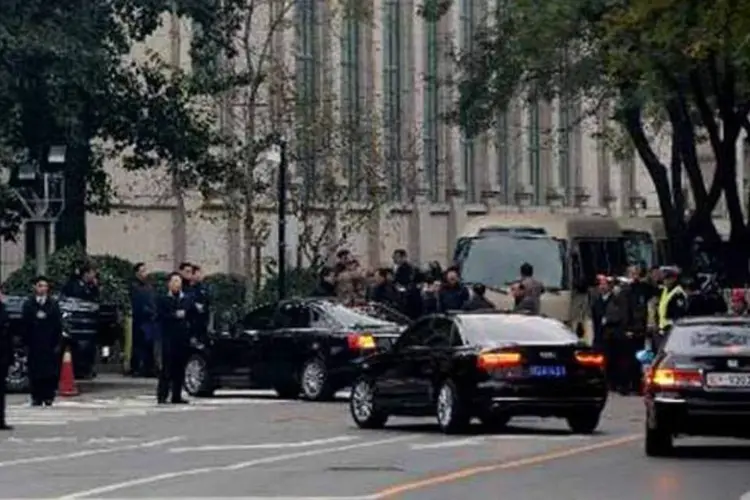 Líderes chineses chegam a hotel para participar de reunião do PCC (Afp.com / MARK RALSTON)