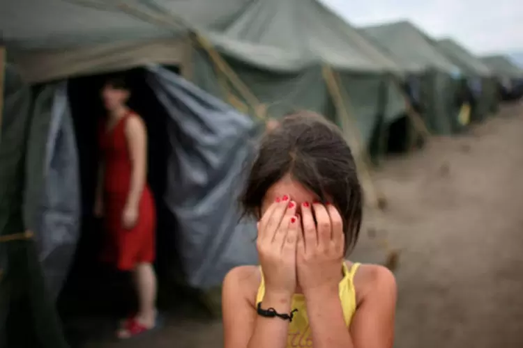
	Crian&ccedil;a em campo de refugiados na Ge&oacute;rgia: ativistas descreveram as agress&otilde;es como &quot;horrores ocultos da guerra&quot;
 (Uriel Sinai/Getty Images)