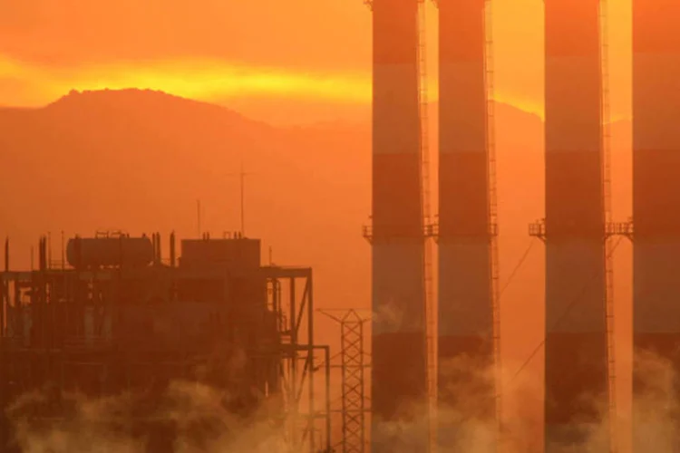 
	Polui&ccedil;&atilde;o: relat&oacute;rio feito por cientistas renomados menciona &quot;risco&quot; 139 vezes, enquanto na avalia&ccedil;&atilde;o anterior, de 2007, a palavra aparecia apenas 41 vezes
 (David McNew/Getty Images)