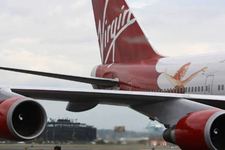 
	Avi&atilde;o da Virgin Atlantic: um dos pilotos tinha &quot;um problema m&eacute;dico ap&oacute;s um incidente com um laser (ocorrido) depois da decolagem&quot;
 (Neilson Barnard/Getty Images)