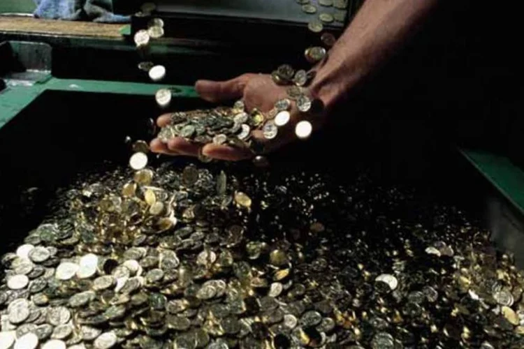 Fabricação de moedas, em abril de 2006 (Luis Davilla/Cover/Getty Images)
