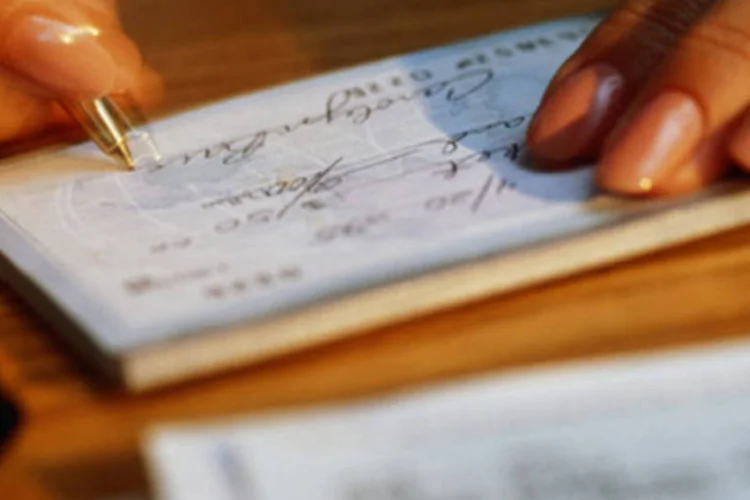 
	Cheque: no acumulado do ano, a taxa recuou 9,1%
 (Getty Images/Getty Images)