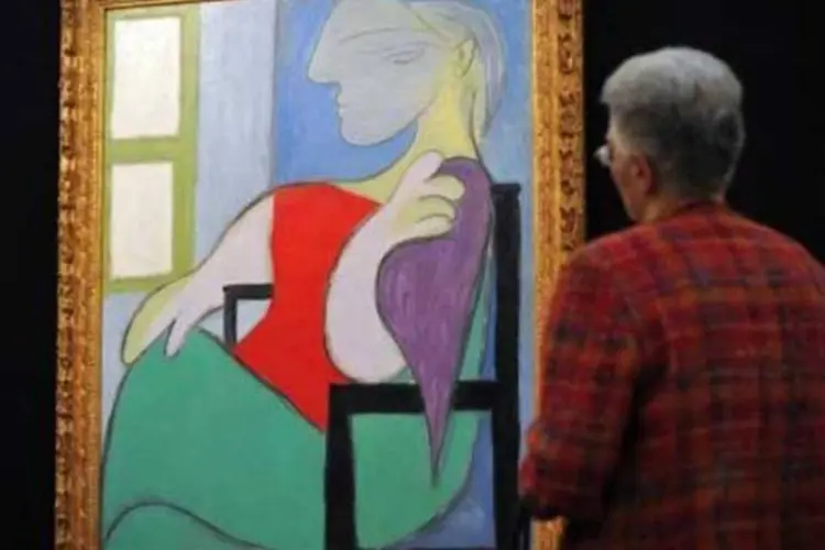 
	&quot;Mulher sentada perto de uma janela&quot;, retrato pintado por Pablo Picasso em 1932
 (AFP/Carl Court)