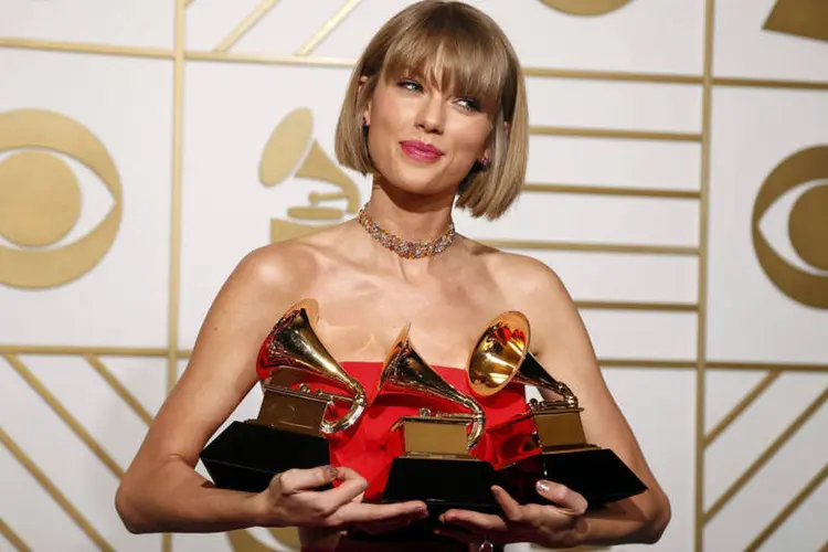 
	Grammy: Taylor Swift levou tr&ecirc;s pr&ecirc;mios - entre eles o de melhor disco do ano com &quot;1989&quot;
 (Reuters/ Lucy Nicholson)