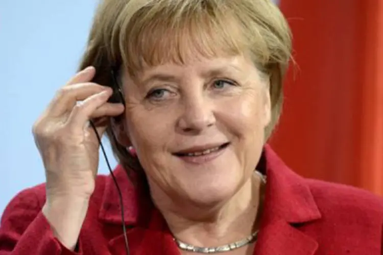 Merkel: "todos devem respeitar o que decidimos. Vinte e cinco países assinaram o pacto orçamentário" (Odd Andersen/AFP)