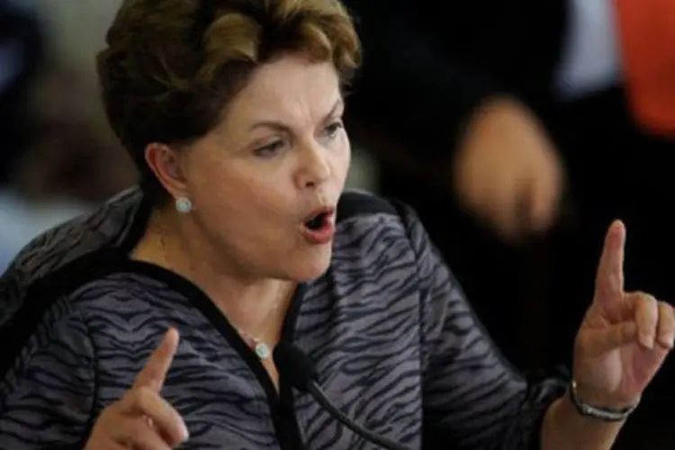 
	A presidente do Brasil, Dilma Rousseff: sem refer&ecirc;ncias diretas, Dilma questionar&aacute; as a&ccedil;&otilde;es dos bancos centrais dos Estados Unidos e da Europa
 (©AFP / Pedro Ladeira)
