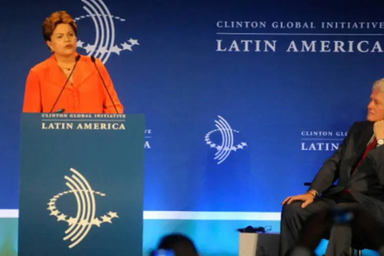 Dilma Rousseff na abertura do evento Clinton Global Initiative Latin America: Fernando Henrique ouviu o discurso de Dilma na primeira fila da plateia (Tânia Rego/ABr)