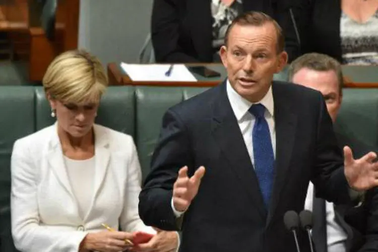 O premier da Austrália, Tony Abbott, discursa no Parlamento e diz que está decidido a enfrentar "a corte australiana de jihadistas endurecidos" (AFP/ Mark Graham)
