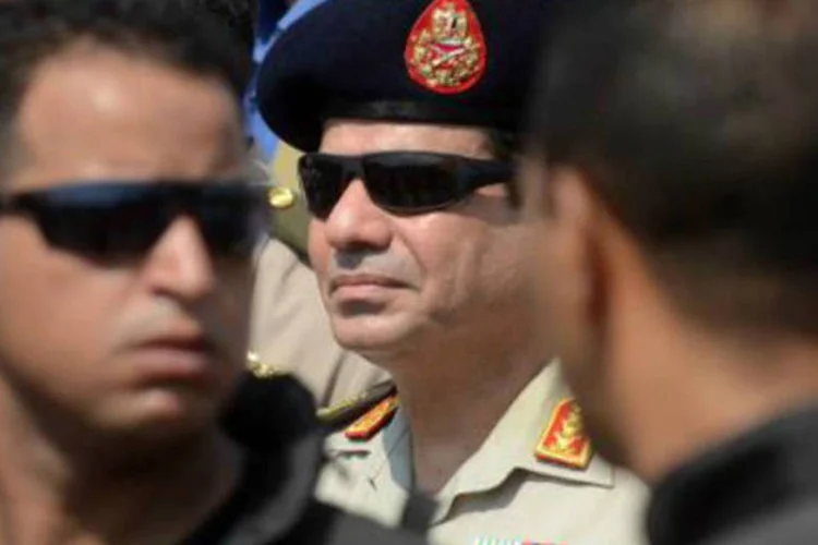 
	O marechal Abdel Fattah al-Sisi: ex&eacute;rcito dep&ocirc;s o presidente Mohamed Mursi no ano passado depois de protestos em massa contra seu governo, e Sisi &eacute; amplamente cotado para ganhar a elei&ccedil;&atilde;o
 (Mohamed El-Shahed/AFP)