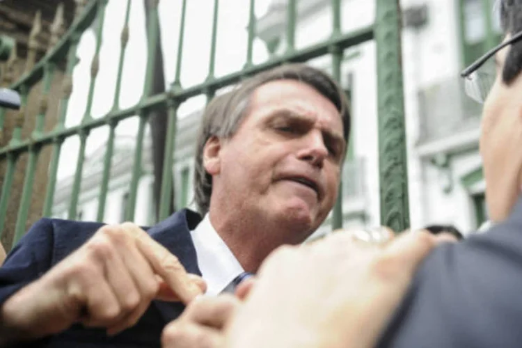
	Jair Bolsonaro e Randolfe Rodrigues: Bolsonaro nega ter agredido o senador, segundo ele, houve apenas troca de empurr&otilde;es e agress&otilde;es verbais
 (Agência Brasil)
