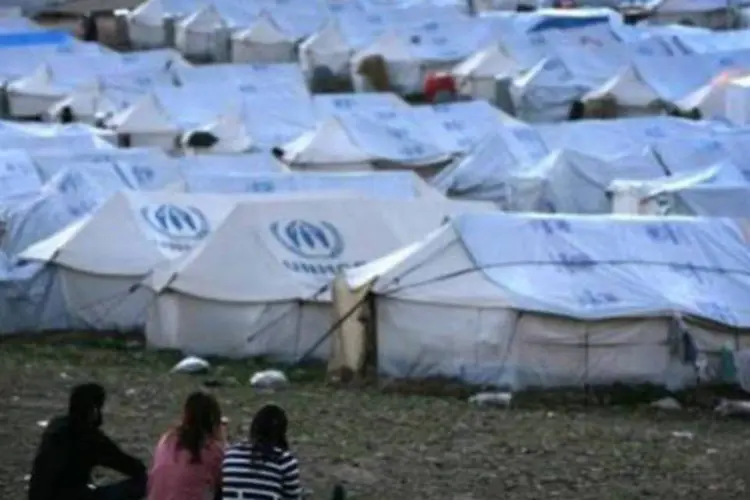 Refugiados: serviços de socorro chegariam diretamente às áreas controladas pela oposição armada (AFP/Arquivos)