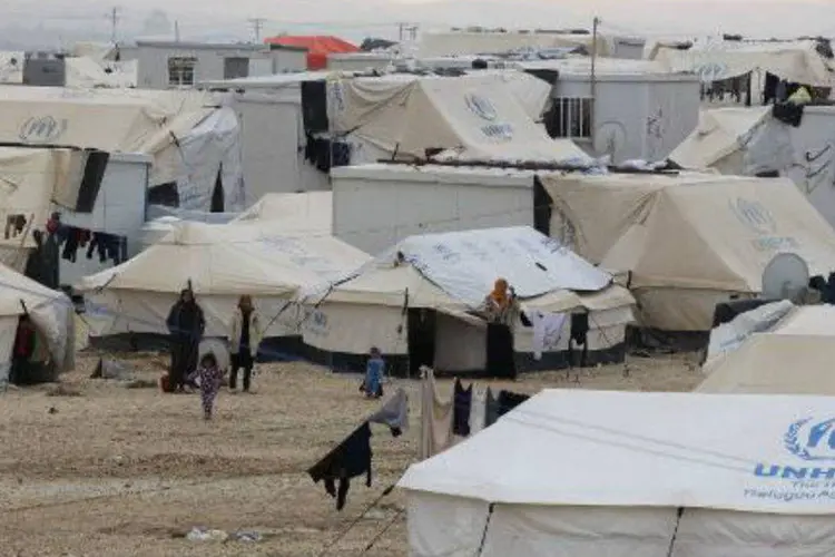 12,2 milhões de sírios necessitam de ajuda, segundo a ONU, mas 40% deles (4,8 milhões) têm dificuldades para consegui-la (AFP/ Khalil Mazraawi)