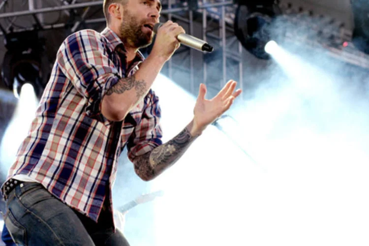 
	Cantor americano Adam Levine da banda Maroon 5: &quot;eu fiquei surpreso e atordoado e quase parecia que eles estavam brincando, mas n&atilde;o estavam&quot;, disse
 (Kevin Winter)