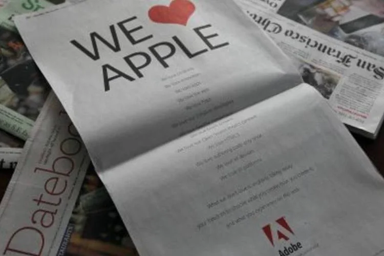 Anúncio publicitário da Adobe foi publicado em jornais norte-americanos desta quinta-feira (13) (.)