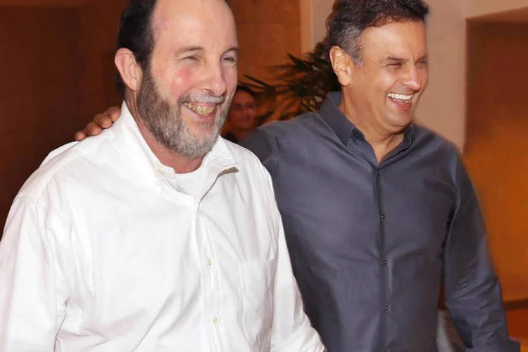 
	A&eacute;cio Neves ap&oacute;s reuni&atilde;o com o ex-presidente do Banco Central Arm&iacute;nio Fraga, no Rio de Janeiro
 (Marcos Fernandes/Coligação Muda Brasil/Divulgação)