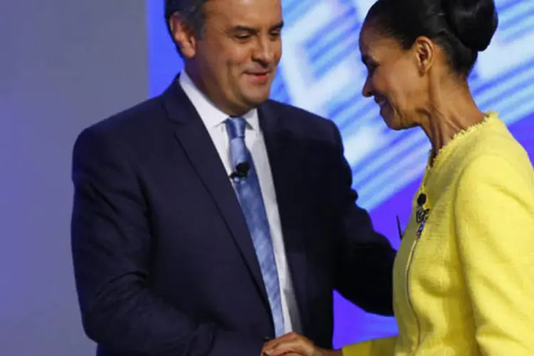 
	A&eacute;cio Neves e Marina Silva: &quot;pessoas com ideias em comum deixam as diferen&ccedil;as de lado e se unem para fazer um Brasil melhor para voc&ecirc;&quot;, disse o tucano
 (Ricardo Moraes/Reuters)