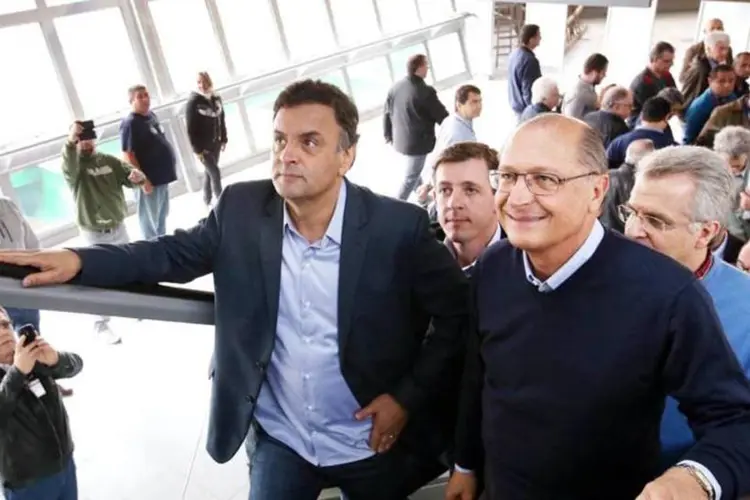 Aécio Neves e Geraldo Alckmin durante visita a estação Vila Prudente do Monotrilho, em São Paulo (Marcos Fernandes/Coligação Muda Brasil/Divulgação/Divulgação)