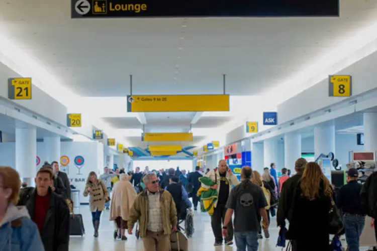 
	Terminal do Aeroporto Internacional JFK:&nbsp;viajantes internacionais podem ficar at&eacute; quatro horas e meia na fila no aeropoto&nbsp;
 (Craig Warga/Bloomberg)
