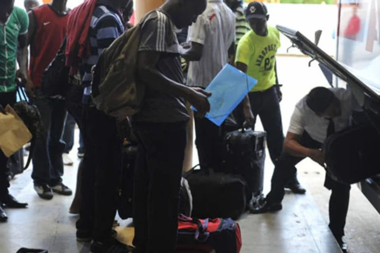 
	Haitianos:&nbsp;o grupo mais numeroso, &nbsp;eles somam 52 fam&iacute;lias&nbsp;
 (Marcello Casal Jr./ABr)