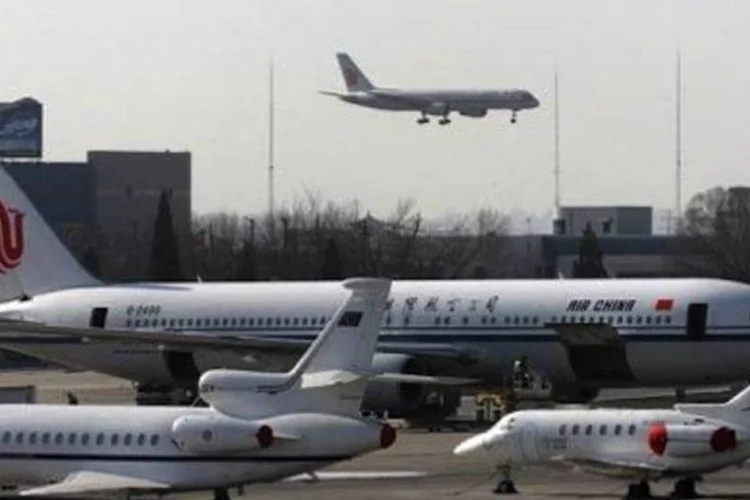 
	Avia&ccedil;&atilde;o: 111 companhias a&eacute;reas estrangeiras de 55 pa&iacute;ses voam atualmente para a China
 (Goh Chai Hin/AFP)