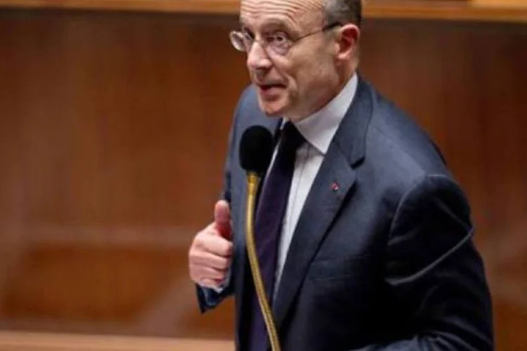 Juppé descartou uma intervenção militar na Líbia sem um mandato da ONU (Martin Bureau/AFP)