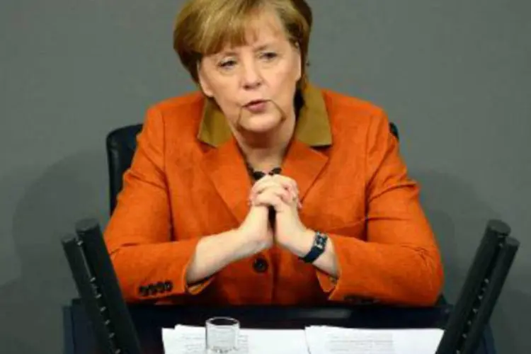 
	Angela Merkel: &quot;quero t&ecirc;-lo como o presidente da Comiss&atilde;o&quot;, disse sobre Juncker
 (AFP)