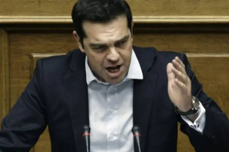 
	O primeiro-ministro grego, Alexis Tsipras: &quot;O que importa agora &eacute; voltar &agrave; normalidade do sistema, mas tamb&eacute;m garantir a capacidade de evitar qualquer movimento que afete nossos cidad&atilde;os mais vulner&aacute;veis&quot;, afirmou Tsipras na reuni&atilde;o
 (Angelos Tzortzinis/AFP)