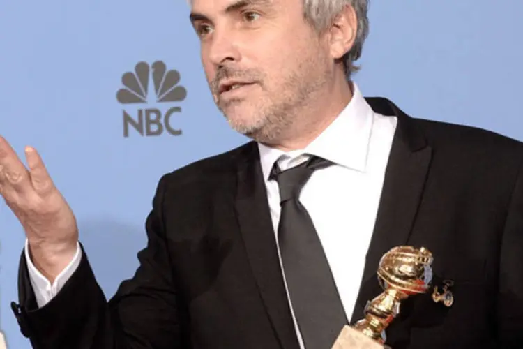 
	Alfonso Cuar&oacute;n, no Globo de Ouro 2014: cerim&ocirc;nia de entrega da 86&ordf; edi&ccedil;&atilde;o do Pr&ecirc;mio Oscar vai acontecer em 2 de mar&ccedil;o
 (Getty Images)