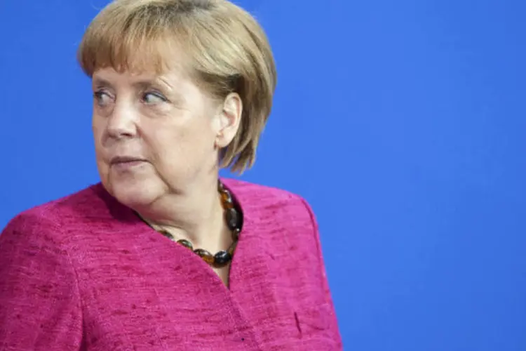 
	Aliados da chanceler alem&atilde; Angela Merkel na Baviera conquistaram a maioria dos votos na elei&ccedil;&atilde;o local
 (Krisztian Bocsi/Bloomberg)