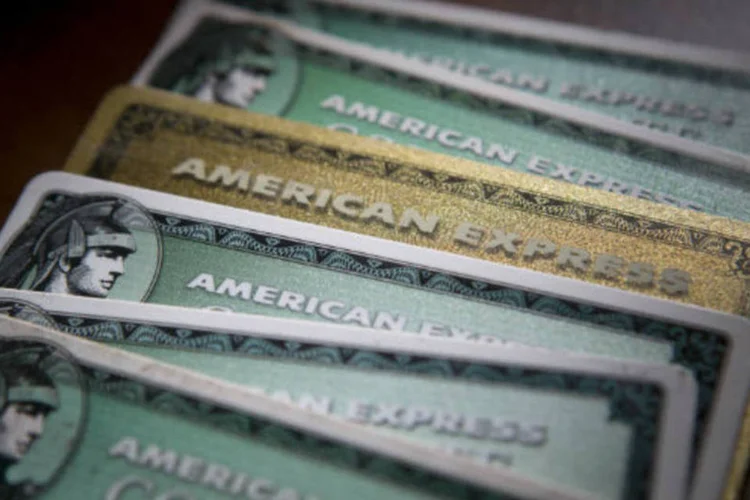 
	Cart&otilde;es de cr&eacute;dito da American Express: corte faz parte de um plano de reestrutura&ccedil;&atilde;o mais amplo destinado a melhorar a efici&ecirc;ncia da empresa
 (Scott Eells/Bloomberg)
