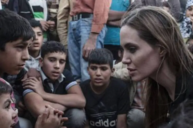 A atriz americana Angelina Jolie pediu nesta quarta-feira o reforço da ajuda aos refugiados sírios: a violência na Síria deixou mais de 93.000 mortos, segundo a ONU. (AFP/O. Laban-Mattei)