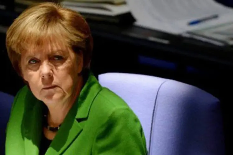Merkel: "tomamos a decisão de fazer parte de uma união monetária. É uma decisão não apenas monetária, mas também política" (Maurizio Gambarini/AFP)