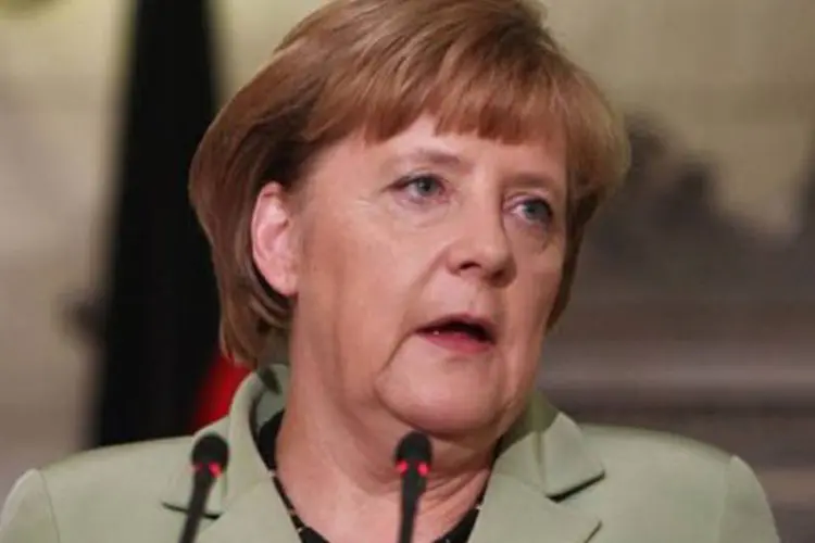 
	A chanceler alem&atilde;, Angela Merkel: &quot;sei muito bem, como venho dos pa&iacute;ses orientais, que as reformas levar&atilde;o bastante tempo&quot;
 (Thanassis Stavrakis/AFP)