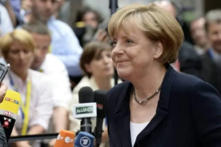 
	Merkel, que completou 61 anos em 17 de julho, n&atilde;o tem feito coment&aacute;rios p&uacute;blicos sobre se vai tentar um quarto mandato
 (Thierry Charlier/AFP)