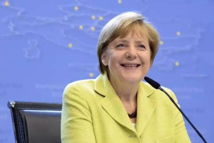 
	Angela Merkel: de acordo com ela, os compromissos do G7 encorajariam muitos pa&iacute;ses emergentes
 (Thierry Charlier/AFP)