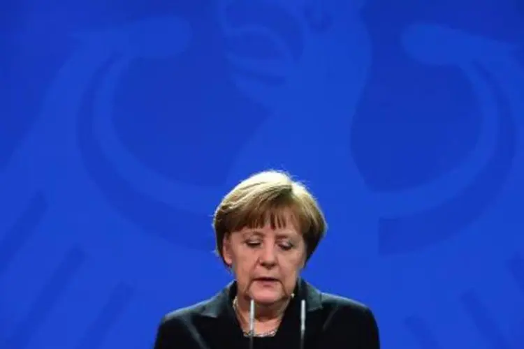 A chanceler alemã faz um pronunciamento em Berlim: "esta tragédia toma uma dimensão completamente inimaginável" (John Macdougall/AFP)