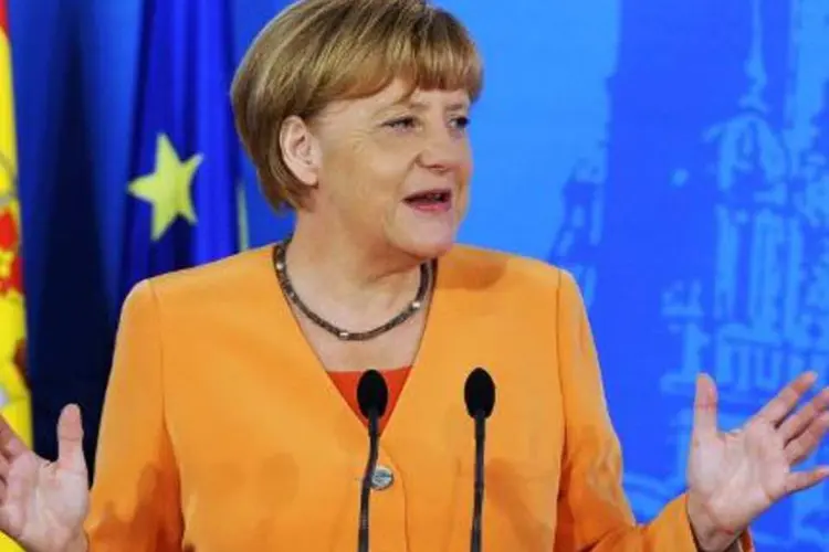 
	A chanceler alem&atilde;, Angela Merkel: &quot;n&atilde;o h&aacute; nenhuma raz&atilde;o para suspender as san&ccedil;&otilde;es&quot;
 (Miguel Riopa/AFP)