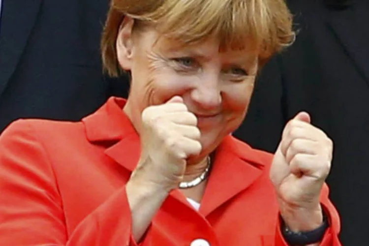 
	Merkel: &quot;nossa equipe fez uma partida muito boa. Somo minha opini&atilde;o a de todo mundo&quot;
 (Darren Staples/Reuters)