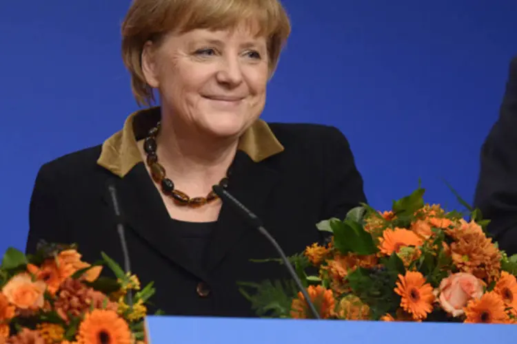 
	Chanceler alem&atilde;, Angela Merkel:&nbsp;eleitores est&atilde;o satisfeitos com a forma como o governo de centro-direita conduziu o pa&iacute;s durante a crise da d&iacute;vida da zona do euro
 (Fabian Bimmer/Reuters)