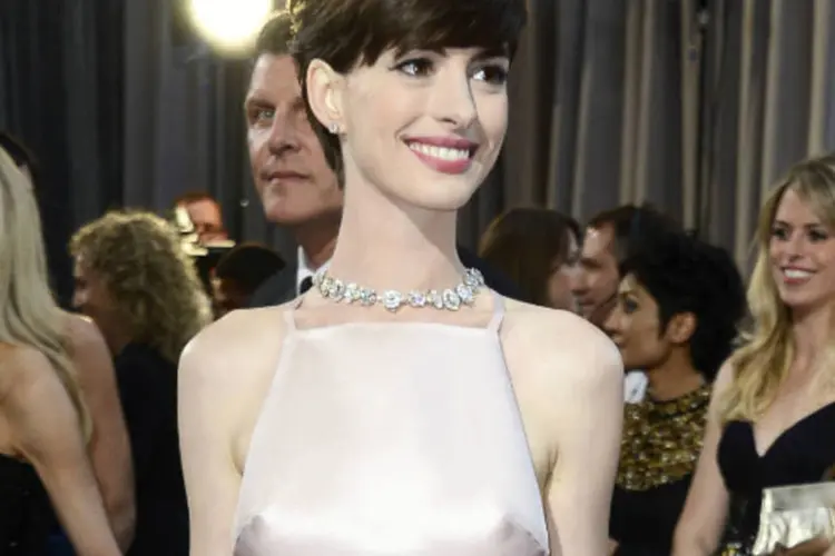 
	Anne Hathaway no Oscar 2013:&nbsp;Hathaway tamb&eacute;m comentou a honra que era para ela vestir um Valentino nesta cerim&ocirc;nia pela profunda rela&ccedil;&atilde;o que tem com a casa italiana.
 (Divulgação)