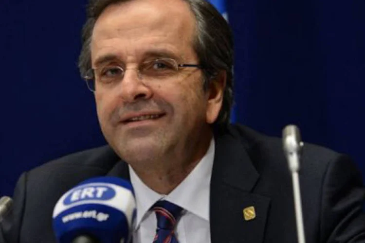 
	Antonis Samaras: premi&ecirc; precisar garantir pelo menos 25 votos dos partidos menores e dos independentes
 (©AFP / Thierry Charlier)